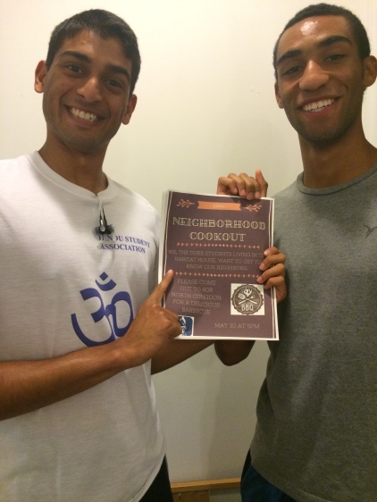 Shubham and Khalid with the flyer for the cookout